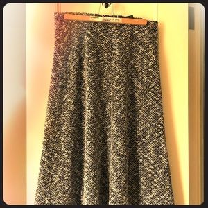 M & S Classic length navy poly cotton skirt.